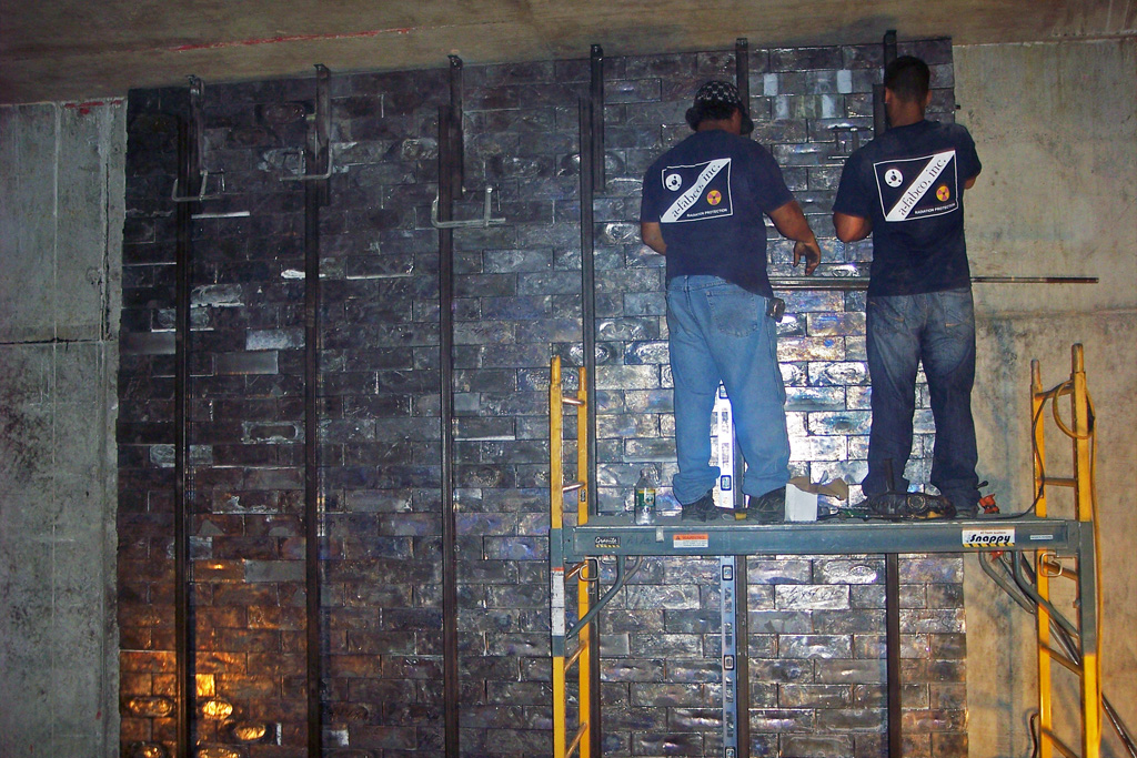 Reinforcing steel · built in front of the finished brick