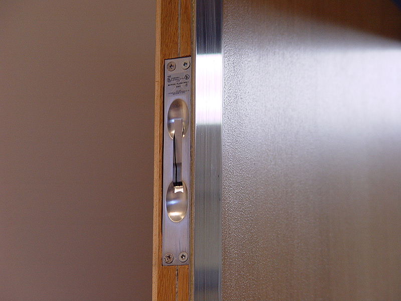 Stainless astragal and manual flush bolts